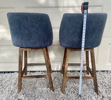 Load image into Gallery viewer, A pair of gorgeous swivel barstools upholstered/ studded with wood/chrome bases