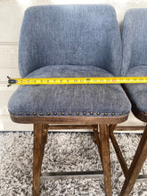 Load image into Gallery viewer, A pair of gorgeous swivel barstools upholstered/ studded with wood/chrome bases