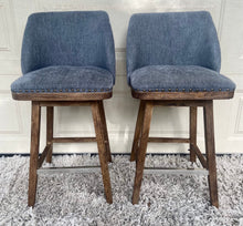 Load image into Gallery viewer, A pair of gorgeous swivel barstools upholstered/ studded with wood/chrome bases