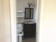 Load image into Gallery viewer, PENDING Mid-Century Modern 4/2/2 w/in-law,AIRBnB or subdivide Possibilities Have a unique chance to own an amazing flat roof 4/2/2 on a huge corner lot