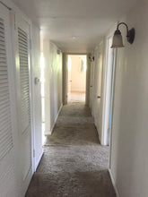 Load image into Gallery viewer, PENDING Mid-Century Modern 4/2/2 w/in-law,AIRBnB or subdivide Possibilities Have a unique chance to own an amazing flat roof 4/2/2 on a huge corner lot