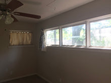 Load image into Gallery viewer, PENDING Mid-Century Modern 4/2/2 w/in-law,AIRBnB or subdivide Possibilities Have a unique chance to own an amazing flat roof 4/2/2 on a huge corner lot