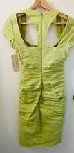 Load image into Gallery viewer, Nicole Miller Artelier pastel green figure flattering designer spring/summer dress.

